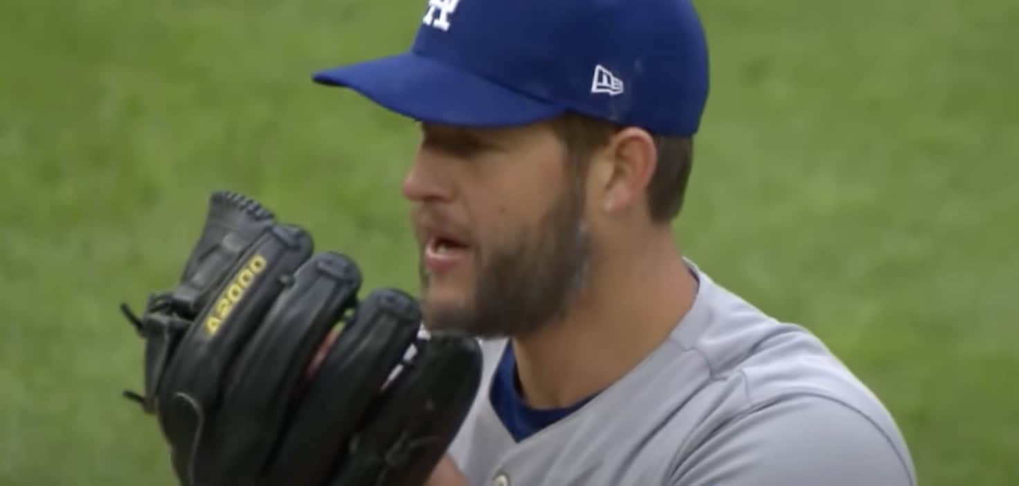 Clayton Kershaw delivering a pitch, showcasing his dominance in the 2010s.